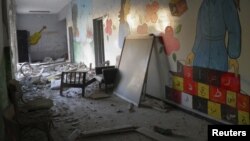 Debris strewn throughout destroyed school at Al Khalidieh, near Homs, September 25, 2012.