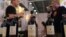 Participants taste Italian Chianti Classico wine at a food expo in Guangzhou, Guangdong province, June 4, 2013. 