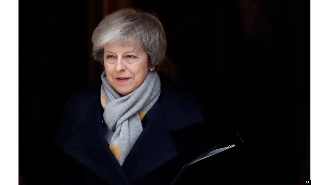 FILE - Britain's Prime Minister Theresa May leaves a cabinet meeting at Downing Street in London, Jan. 15, 2019.