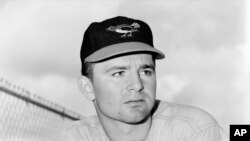 FILE - This 1959 photo shows Baltimore Orioles minor league pitcher Steve Dalkowski in Miami, Fla. Dalkowski, a hard-throwing, wild left-hander, inspired the creation of the character Nuke LaLoosh in the movie "Bull Durham."