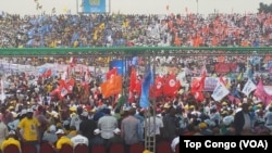 FILE - With the colors of their parties, tens of thousands of supporters gathered at the stadium Tata Raphaël to express their support for President Joseph Kabila in Kinshasa, DRC, July 29, 2016. (VOA/Top Congo)