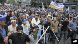 Georgian opposition supporters during a protest rally in downtown Tbilisi, Georgia, Wednesday, May 25, 2011