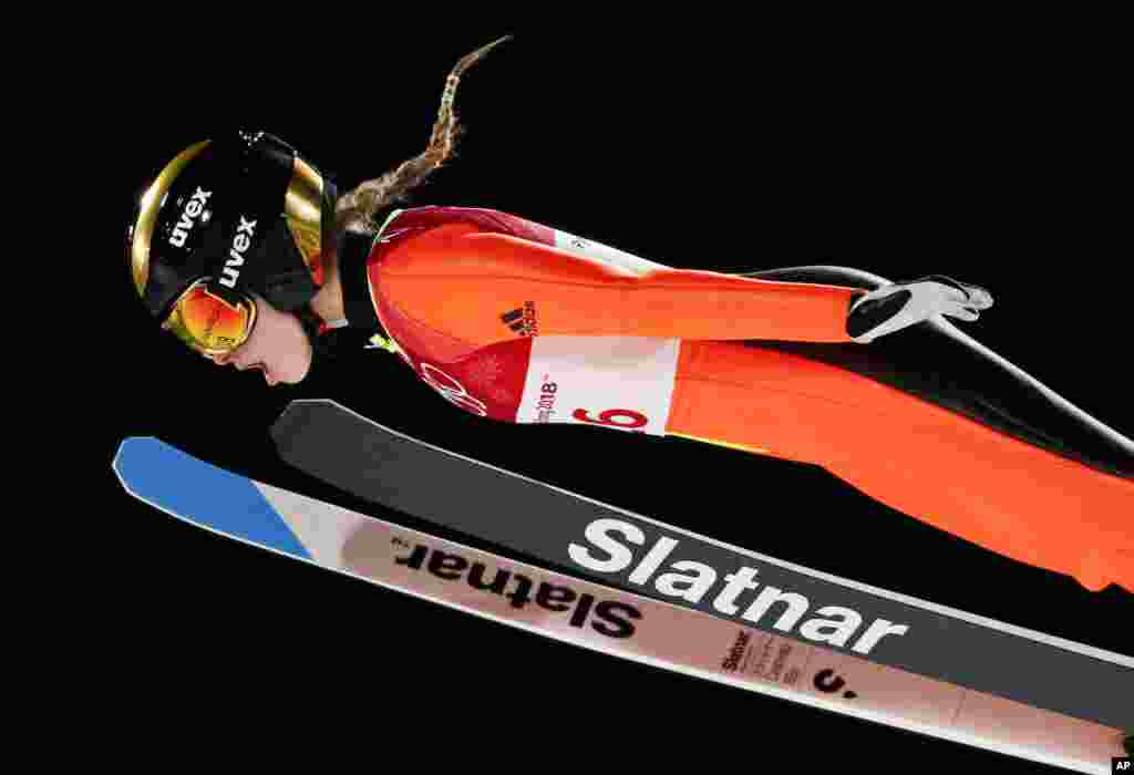 Nika Kriznar, of Slovenia, soars through the air during the women's normal hill individual ski jumping competition at the 2018 Winter Olympics in Pyeongchang, South Korea, Feb. 12, 2018. 