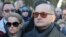 FILE - Poland's last communist leader Gen. Wojciech Jaruzelski, with daughter Monika, left, attend funeral ceremonies for Mieczyslaw Rakowski, in Warsaw, Poland.