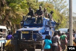 Malawi police provide security as women march in Blantyre, July 10, 2019. (Lameck Masina)