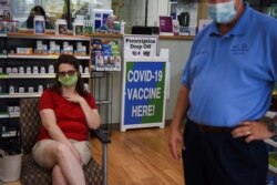 COVID-19 vaccines are administered at Floyd's Family Pharmacy as cases of the coronavirus disease (COVID-19) surge in Ponchatoula, Louisiana, Aug. 5, 2021.