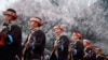 FILE - Tibetans play their traditional musical instruments to commemorate Serf Liberation Day in Nyingchi Prefecture, Tibet Autonomous Region.