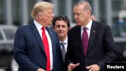 Donald Trump et Recep Tayyip Erdogan au sommet de l'Otan à Bruxelles, Belgique, le 11 juillet 2018. 