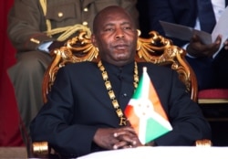 FILE - Burundi's President Evariste Ndayishimiye at the Ingoma stadium in Gitega, Burundi, June 18, 2020.