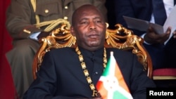 FILE - Burundi's President Evariste Ndayishimiye at the Ingoma stadium in Gitega, Burundi, June 18, 2020.