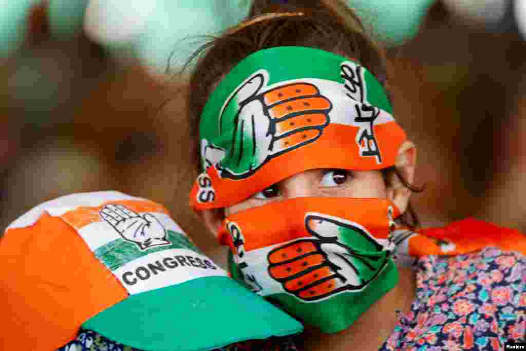 Supporters of the Congress party attend an election campaign rally of Rahul Gandhi, a senior leader of India&#39;s main opposition, the Congress party, ahead of the second phase of the assembly election, on the outskirts of Srinagar, India.