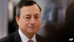 FILE - European Central Bank's President Mario Draghi.