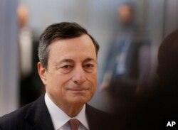 FILE - European Central Bank's President Mario Draghi.