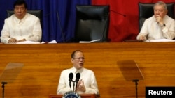 Philippine President Benigno Aquino (C) is seen delivering a speech at the House of Representatives in Quezon City, Manila, in this July 22, 2013, file photo.
