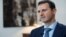 FILE - Syria's President Bashar al-Assad speaks during an interview with the Iranian Khabar TV channel in this handout photograph released by Syria's national news agency SANA, Oct. 4, 2015. 