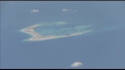 美军“能实施”争议岛礁12海里使命 中国示警