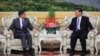 China's Xi Jinping Meets with US Treasury Chief 