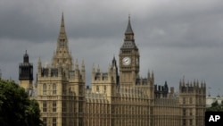 FILE - A general view of the Houses of Parliament on the river Thames in London.