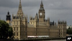 FILE - A general view of the Houses of Parliament on the river Thames in London.