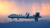 资料照片：通用原子航空系统有限公司的MQ-9B“空中卫士”无人机飞往英国皇家空军位于英国格洛斯特郡费尔福德的基地。(Photo: Business Wire)