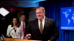 Secretary of State Mike Pompeo, accompanied by State Department spokeswoman Morgan Ortagus, left, and Sam Brownback, Ambassador at Large for International Religious Freedom, second from left, arrives for a news conference in Washington, June 10, 2020.