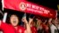 Supporters of Myanmar's National League for Democracy party cheer as election results are posted outside the NLD headquarters in Yangon, Myanmar, Nov. 9, 2015. 