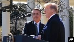 ABŞ prezidenti Donald Tramp və Braziliya prezidenti Jair Bolsonaro mətbuat konfransından sonra, 19 mart, 2019.