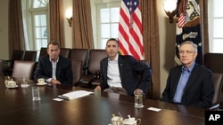 President Barack Obama meets with Senate Majority Leader Harry Reid, right, and House Speaker John Boehner, left, in the Cabinet Room of the White House, July 23, 2011