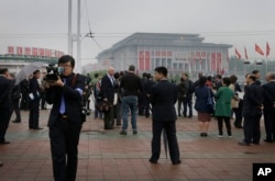 Foreign journalists film and report from across the April 25 House of Culture, the venue for the 7th Congress of the Workers' Party of Korea, May 6, 2016, in Pyongyang, North Korea.