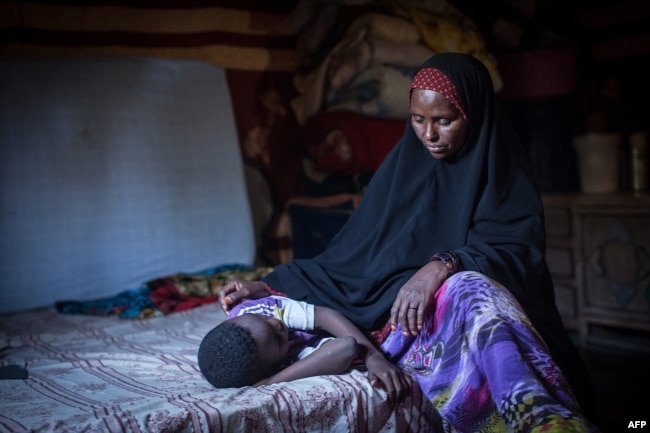 FILE — Amran Mahamood used to circumcise young girls in Hargeysa, Somalia, but stopped after a religious leader convinced her the rite was not required by Islamic law.