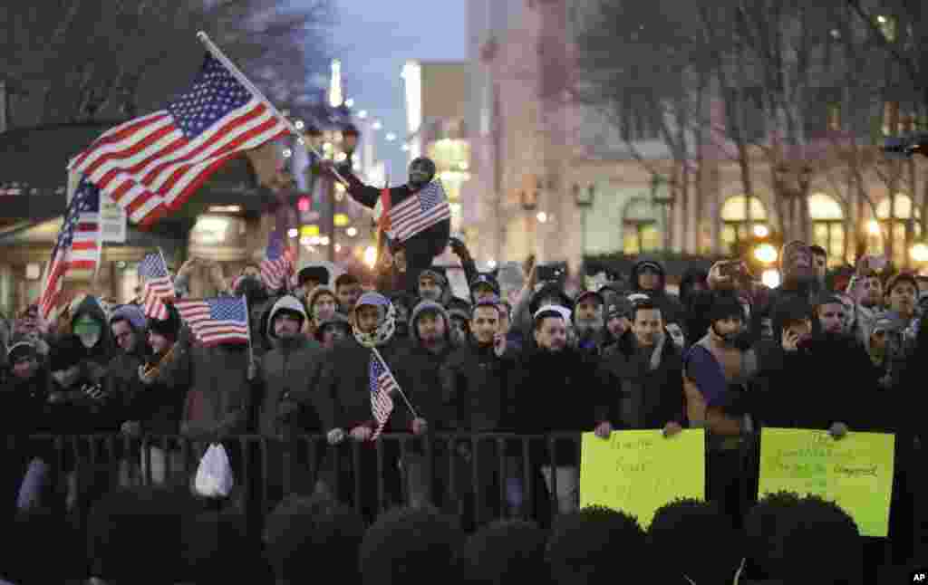 Protesters gather at Brooklyn Borough Hall to protest President Donald Trump's immigration order, Feb. 2, 2017, in New York. More protests are scheduled.