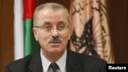 Rami Hamdallah, president of al-Najah National University, speaks during a meeting at the university in the West Bank city of Nablus. (File)
