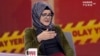 In this image from TV, Hatice Cengiz, who is Turkish, reacts during an interview on Turkish television channel HaberTurk, Oct. 26, 2018, about the day her fiance, Saudi journalist Jamal Khashoggi entered the Saudi Arabia Consulate on Oct. 2, and was killed inside.