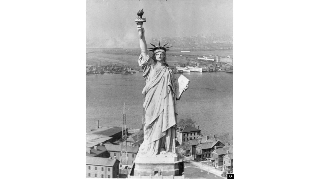 The Statue of Liberty in New York Harbor with New Jersey in the background, Oct. 12, 1933.