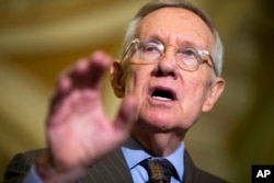 FILE - Senate Minority Leader Sen. Harry Reid of Nev. speaks during a news conference on Capitol Hill in Washington, Sept. 16, 2015.