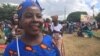 Mulheres celebram o dia da Mulher Moçambicana pintadas de mussiro e vestidas de capulana. Nampula. 7 de Abril