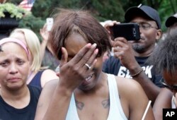 Diamond Reynolds, the girlfriend of Philando Castile of St. Paul, cries outside the governor's residence in St. Paul, Minn., on July 7, 2016.