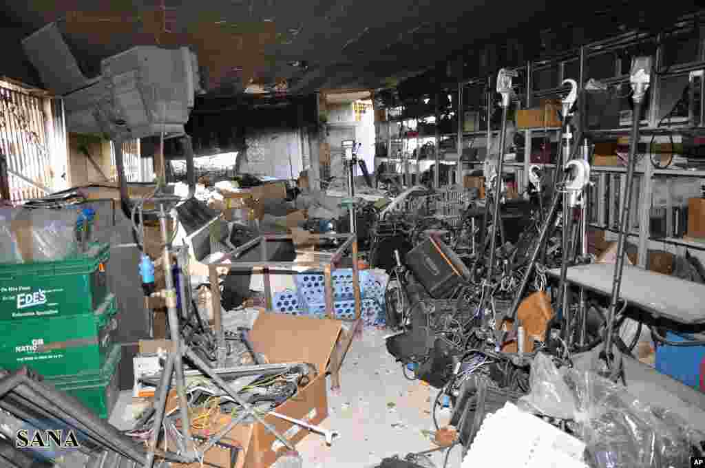 A damaged equipment storage room of the Ikhbariya TV station after it was attacked by gunmen in Drousha (photo released by the Syrian official news agency, SANA)