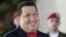 Venezuela's President Hugo Chavez smiles as he delivers a speech at Miraflores presidential palace in Caracas, Venezuela, June 4, 2012.