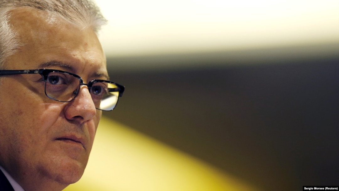 FILE - Aldemir Bendine, the former chief executive of state-controlled oil firm Petroleo Brasileiro SA, listens to a question during a news conference in Rio de Janeiro, Brazil, Jan. 28, 2016. 