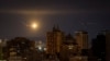 An explosion of a drone is seen in the sky over the city during a Russian drone strike in Kyiv, Ukraine Sept. 30, 2024.