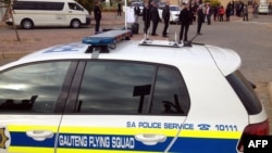 Photo courtesy of Eye Witness News (EWN) shows Gauteng Flying Squad vehicle waiting to escort Gupta wedding guests to Sun City, Waterkloof Airforce Base, near Pretoria, April 30, 2013.