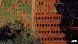 An aerial view shows a burial site at the Vila Formosa cemetery during the coronavirus pandemic, in Sao Paulo, Brazil, June 21, 2020.