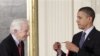 President Barack Obama stands with Stephen J. Benkovic, of Pennsylvania State University, recognized for his accomplishments in organic chemistry, at a ceremony for recipients of the National Medal of Science and the National Medal of Technology and Innov