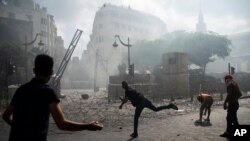 Okršaj policije i demonstranata koji protestuju protiv političke elite i vlade posle smrtosnone eksplozije u Bejrutu, 8. avgusta 2020.