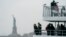  The Statue of Liberty and Ellis Island ferry transports passengers, Jan. 5, 2019, in New York, as the U.S. government shutdown enters its third week. New York state funds are being used to keep the attractions open during the shutdown, which has affected