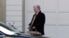 FILE - Former national security adviser John Bolton leaves his home in Bethesda, Maryland, Jan. 28, 2020.