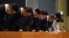 香港宏福苑大火调查报告公开后，特首李家超和其他官员在新闻发布会上鞠躬道歉。(2026年10月29日)
