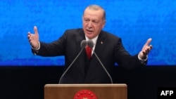 Turkish President Recep Tayyip Erdogan delivers a speech at the Bestepe National Congress and Culture Center in Ankara, July 21, 2020.