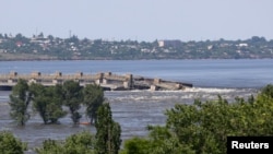 Вид на прорыв плотины Каховской ГЭС в Херсонской области